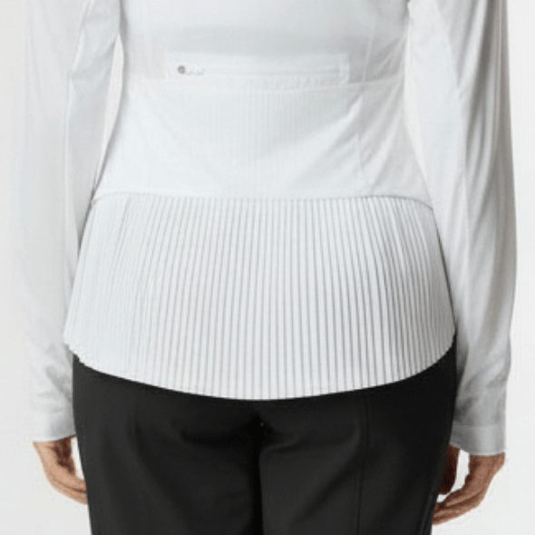 Woman wearing a white long-sleeve athletic jacket with pleats on back