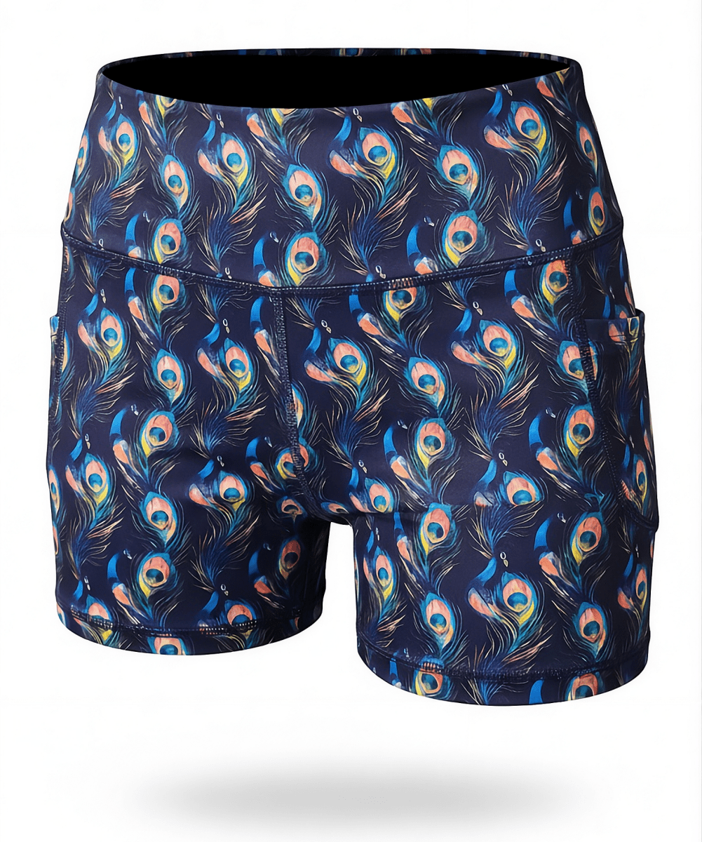 NGA UnderThere Shorts with peacock feather pattern on a navy background