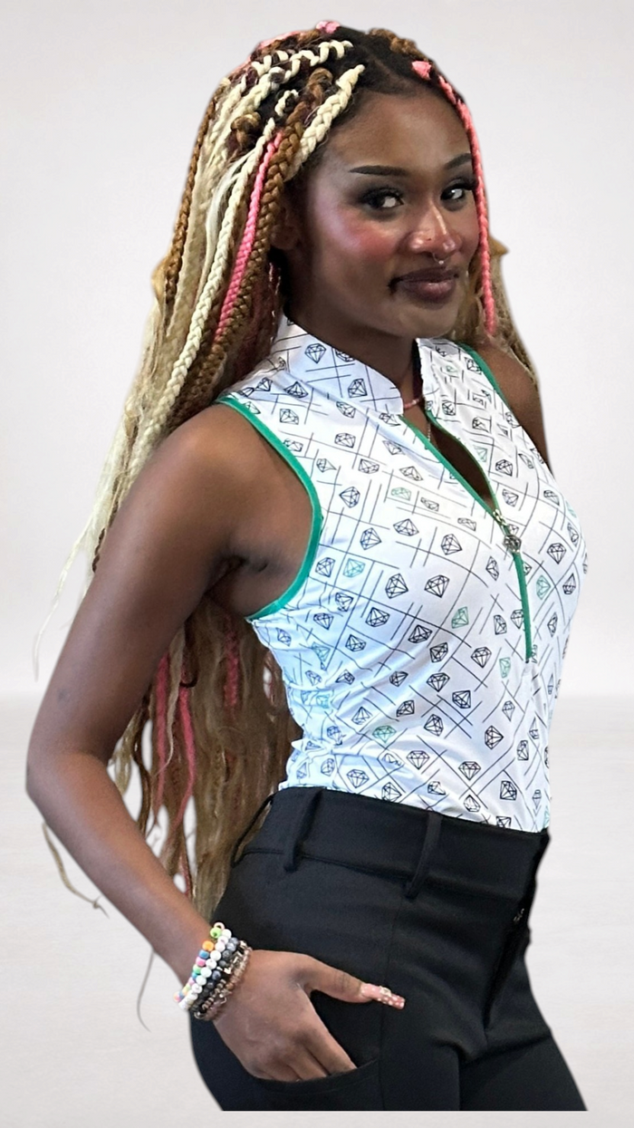Model wearing NGA - No Girls Allowed green diamond pattern racerback top with mock neck and 10-inch zipper